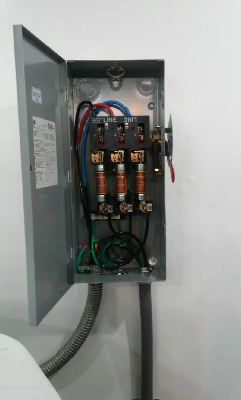 Three-phase disconnect switch installed for Smoke Detector Installation in Talladega