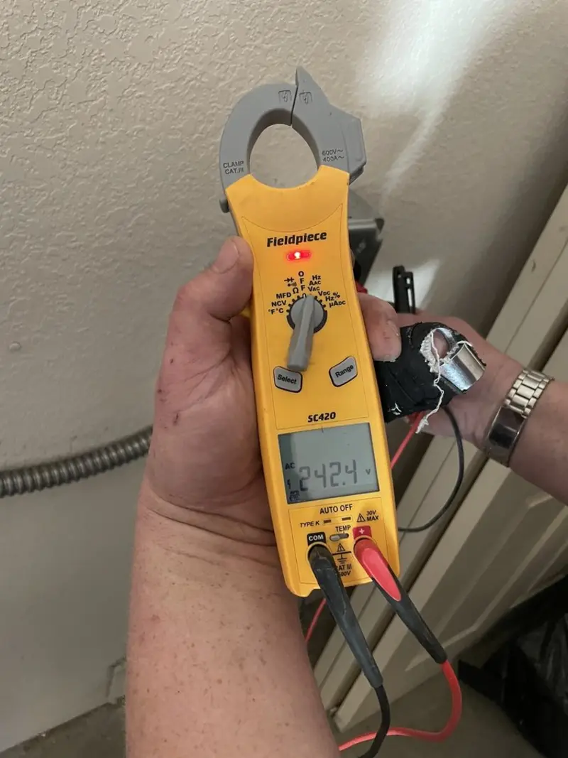 Voltage testing with clamp meter during Hot Tub / Pool Electrical Wiring in Talladega